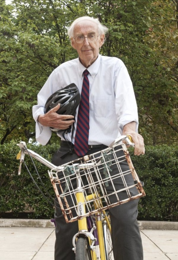 Colman McCarthy on bicycle